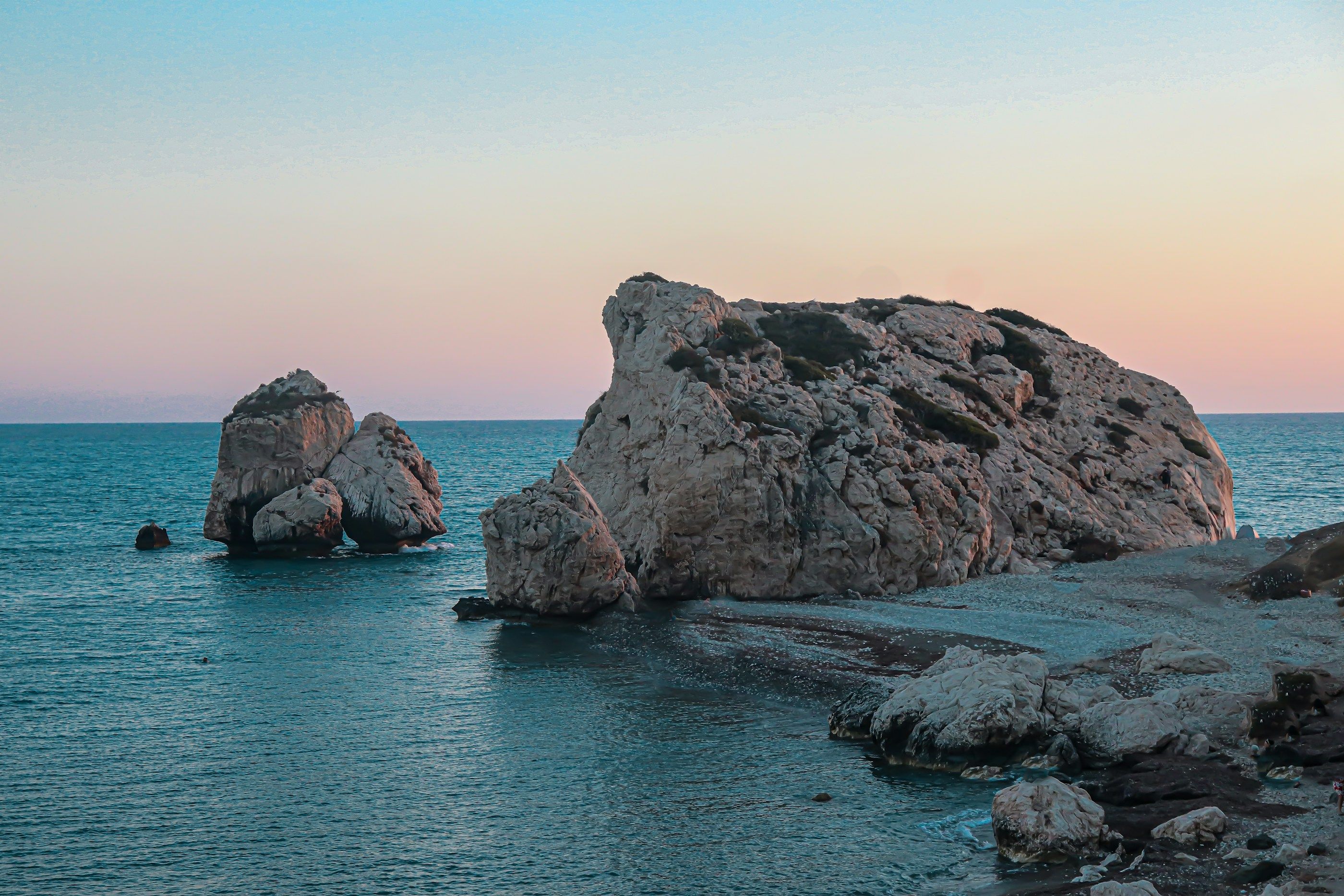 Aphrodite’s Rock in soft evening light.